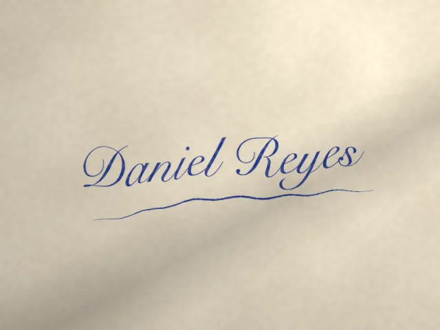 Original photo: Blue ballpoint on white paper, photographed under a warm desk lamp